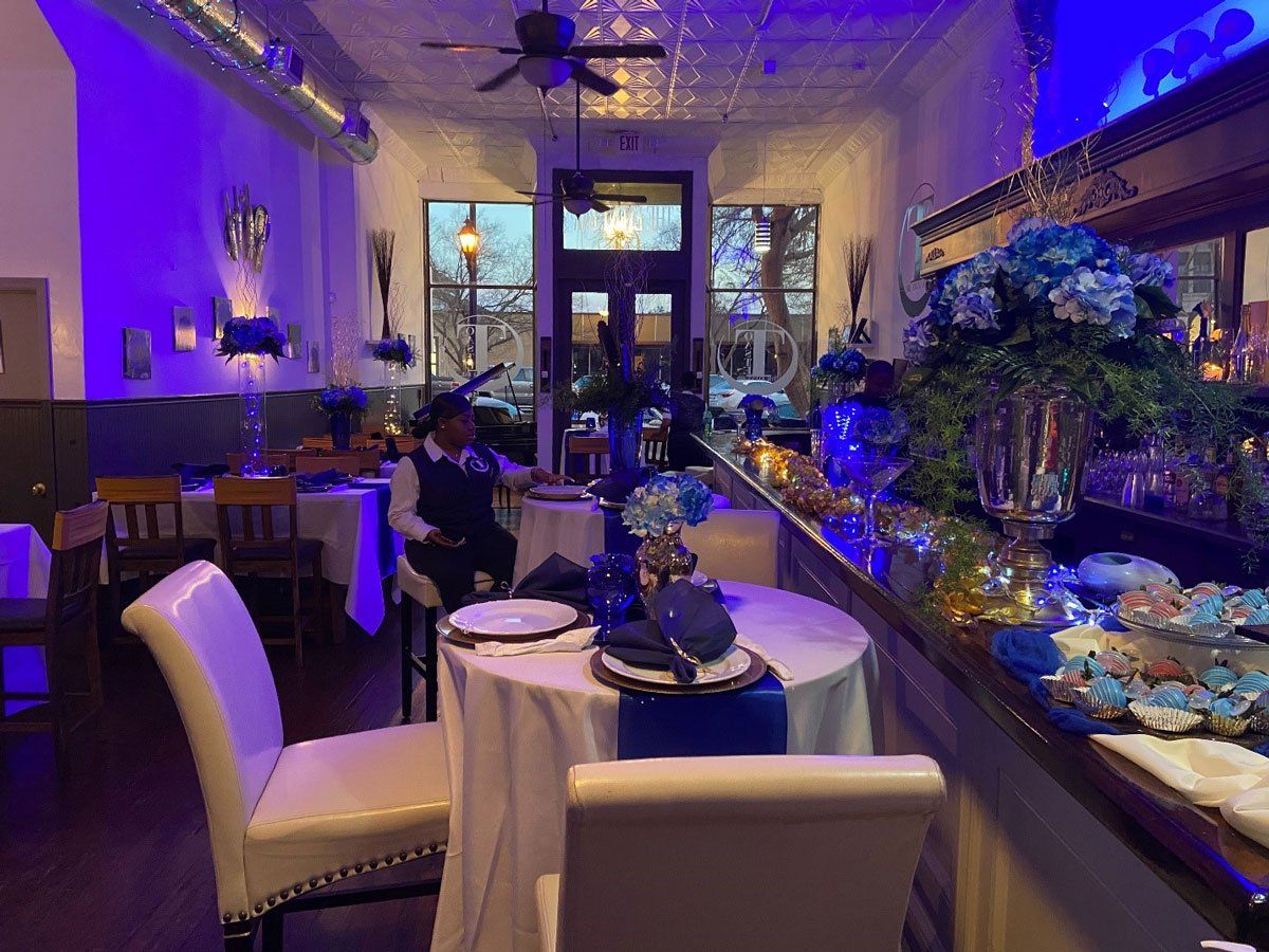 Woman Sitting in The Middle of An Event — Augusta, GA — Toaste