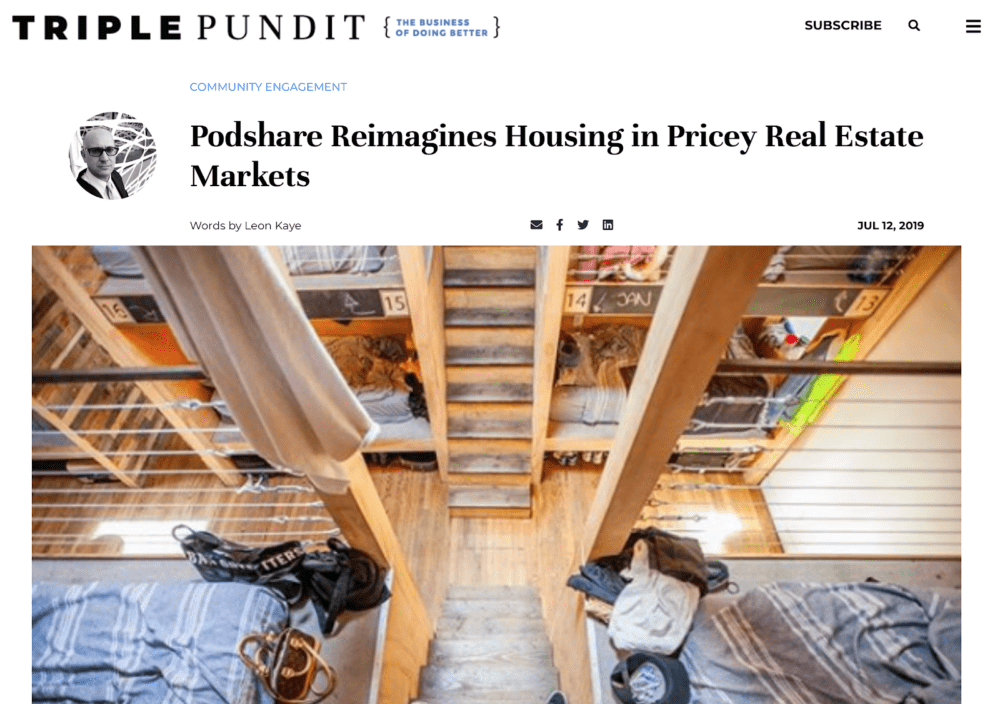 Two beds in Podshare unit, a shared living space. Wooden beams above, looking downward.