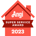 A red house with a red ribbon that says `` angi super service award ''.