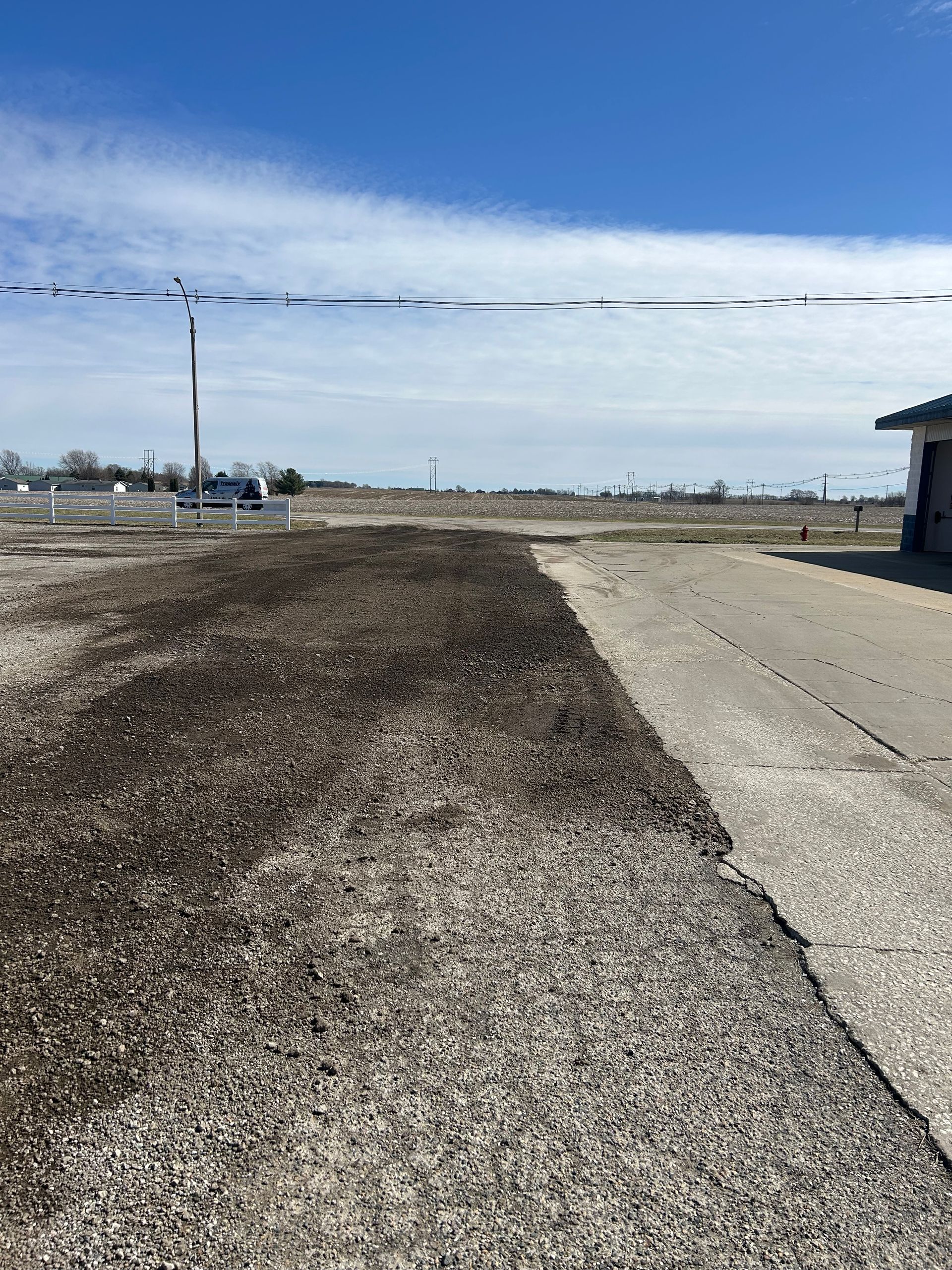 There is a lot of dirt on the side of the road.