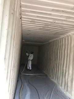 Spraying Foam Insulation Using Spray Gun — Medford, OR — All Phase Weatherization & Construction LLC