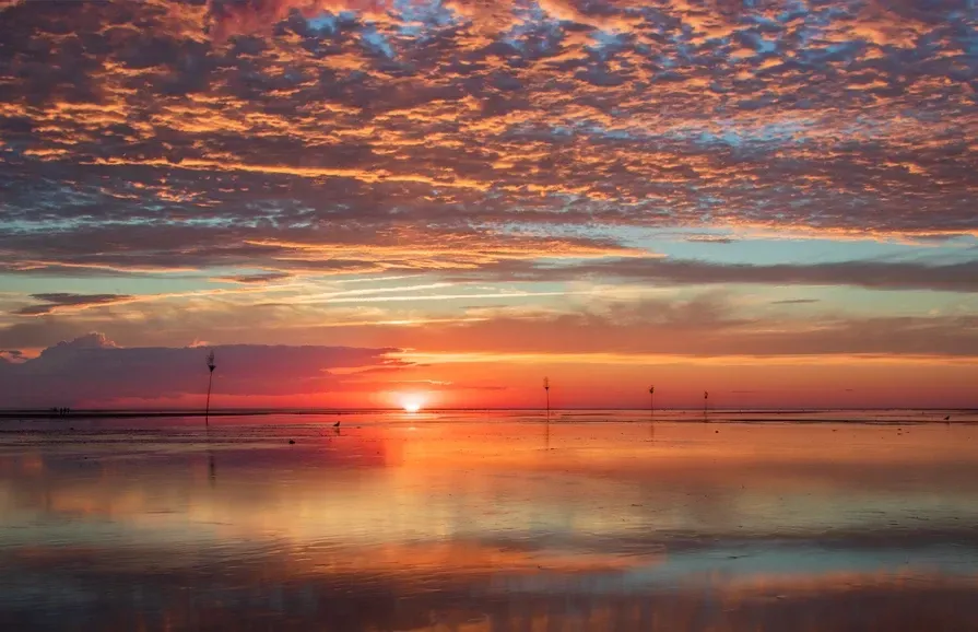 Pat Watson_Fiery Sunset at Rock Harbor_Clouds.jpeg