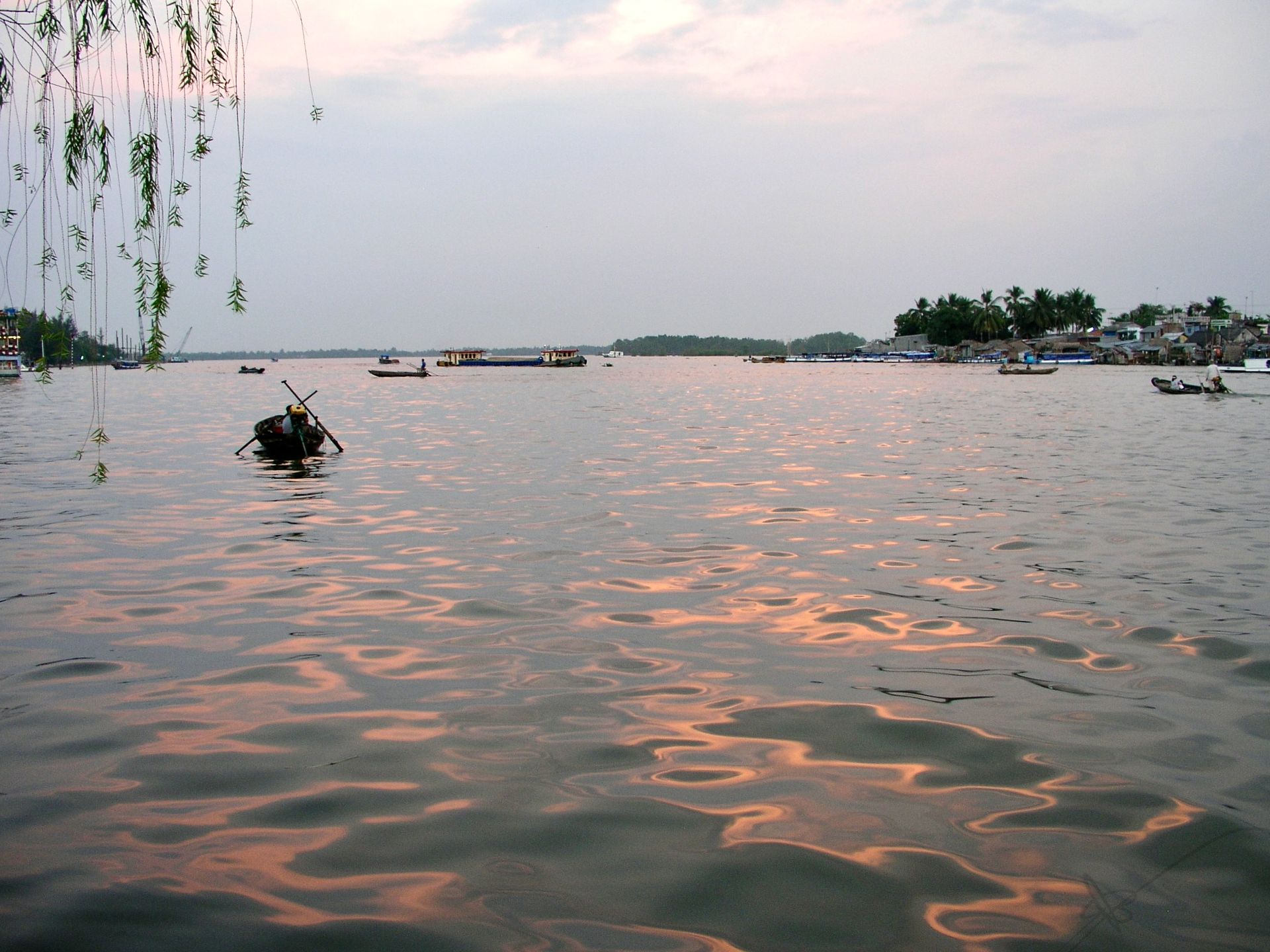 A large body of water with boats in it