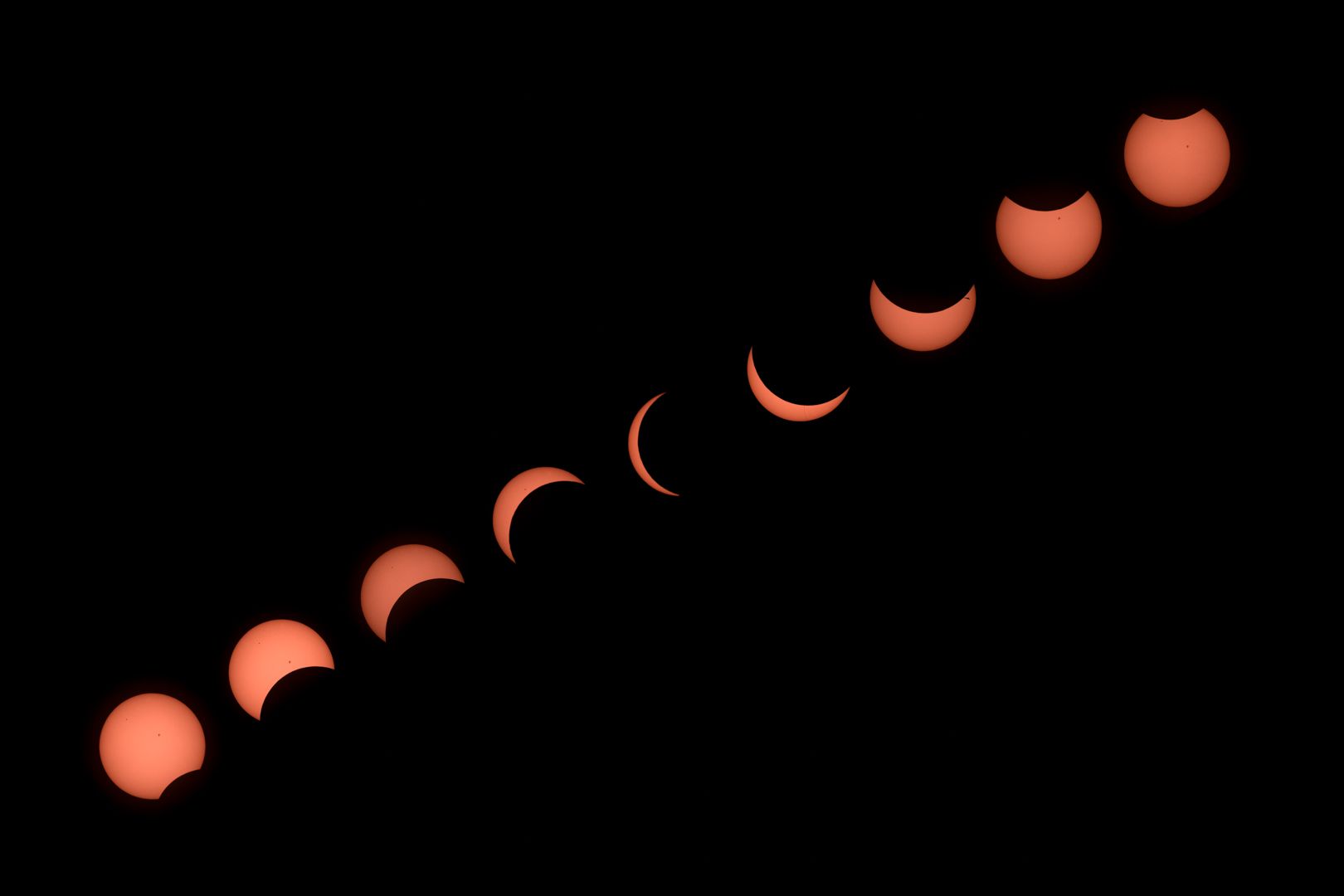 A series of images showing the phases of an eclipse.