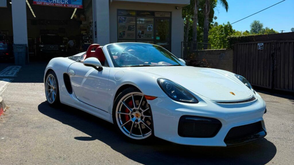 White 2016 Porsche Boxster Spyder car parked outside | Euro Auto Tech & Smog