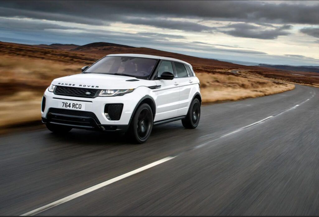 2018 Range Rover Evoque White car driving on the road | Euro Auto Tech & Smog
