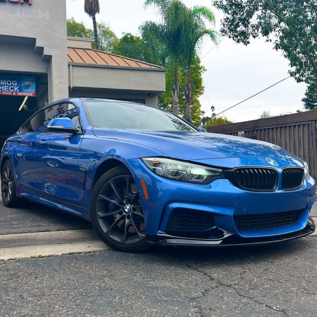 Blue BMW 440i car parked outside of our shop | Euro Auto Tech & Smog