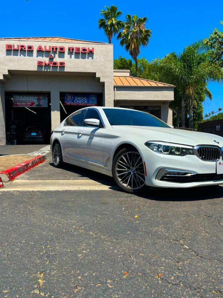 BMW 540i White car parked outside of our shop | Euro Auto Tech & Smog