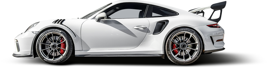 Side view of a white Porsche 911 GT3 RS with a prominent rear wing and red brake calipers against a white background | Euro Auto Tech & Smog