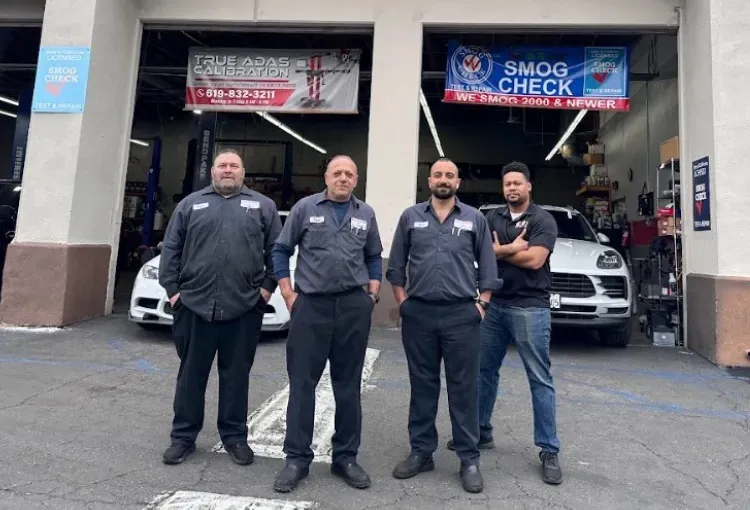 Staff Members in front of garage | Euro Auto Tech & Smog