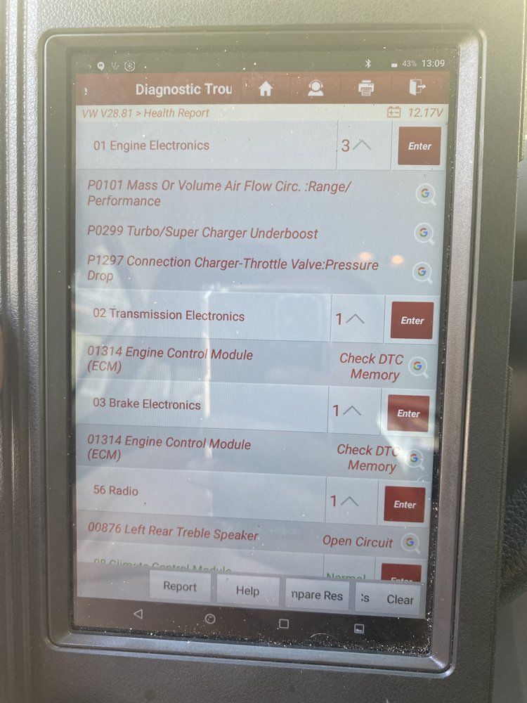 Diagnostic tool displaying engine, transmission, and body module error codes.