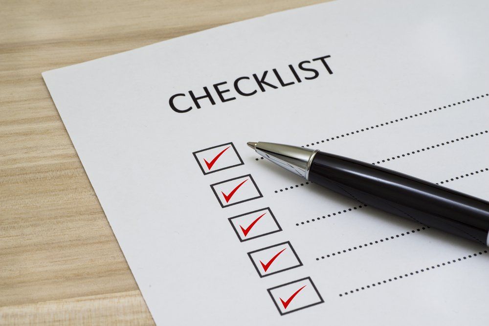 Checklist Box with Red Checkmark — Cairns Traffic Lawyers  in Cairns, QLD