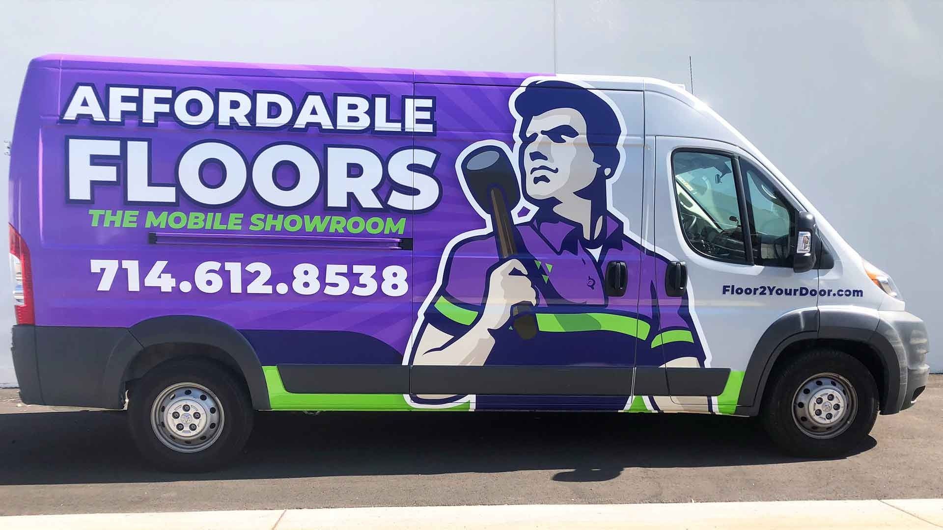 A side view of a van wrapped in purple, green, and white branding for 
