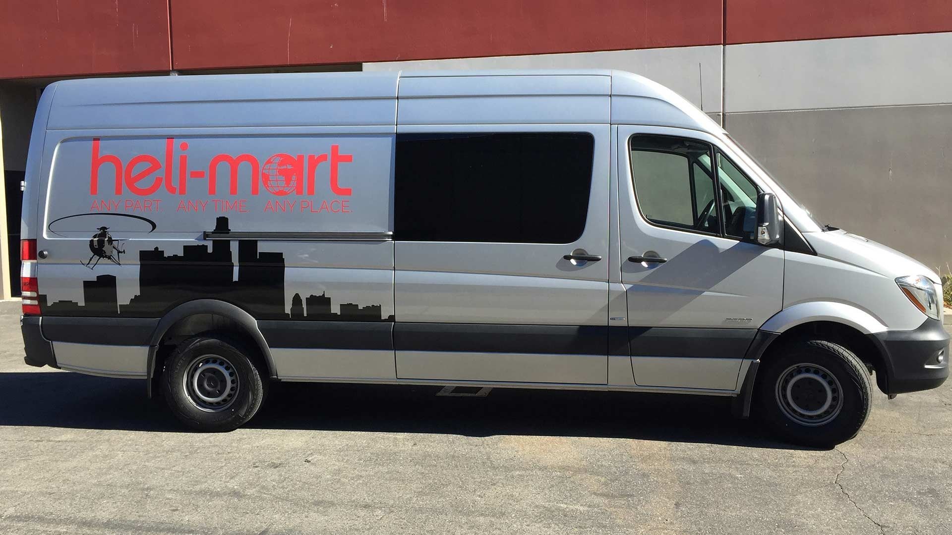 Silver Sprinter van featuring a 