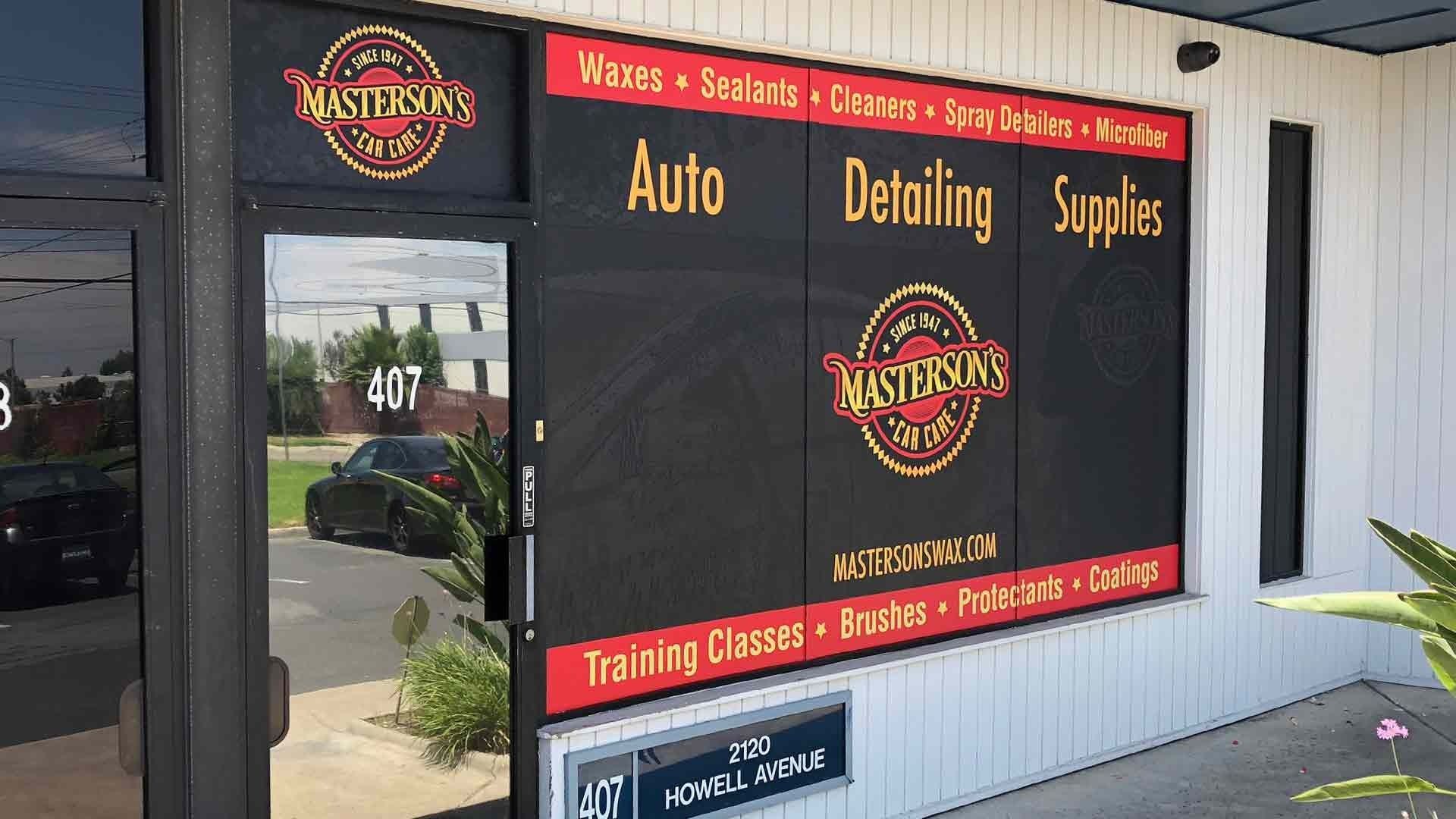 Storefront for Masterson's Car Care, an auto detailing supply shop with branding, address 407, and service info on window.