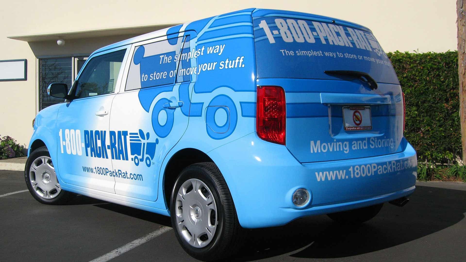 A blue Scion xB vehicle wrapped in 