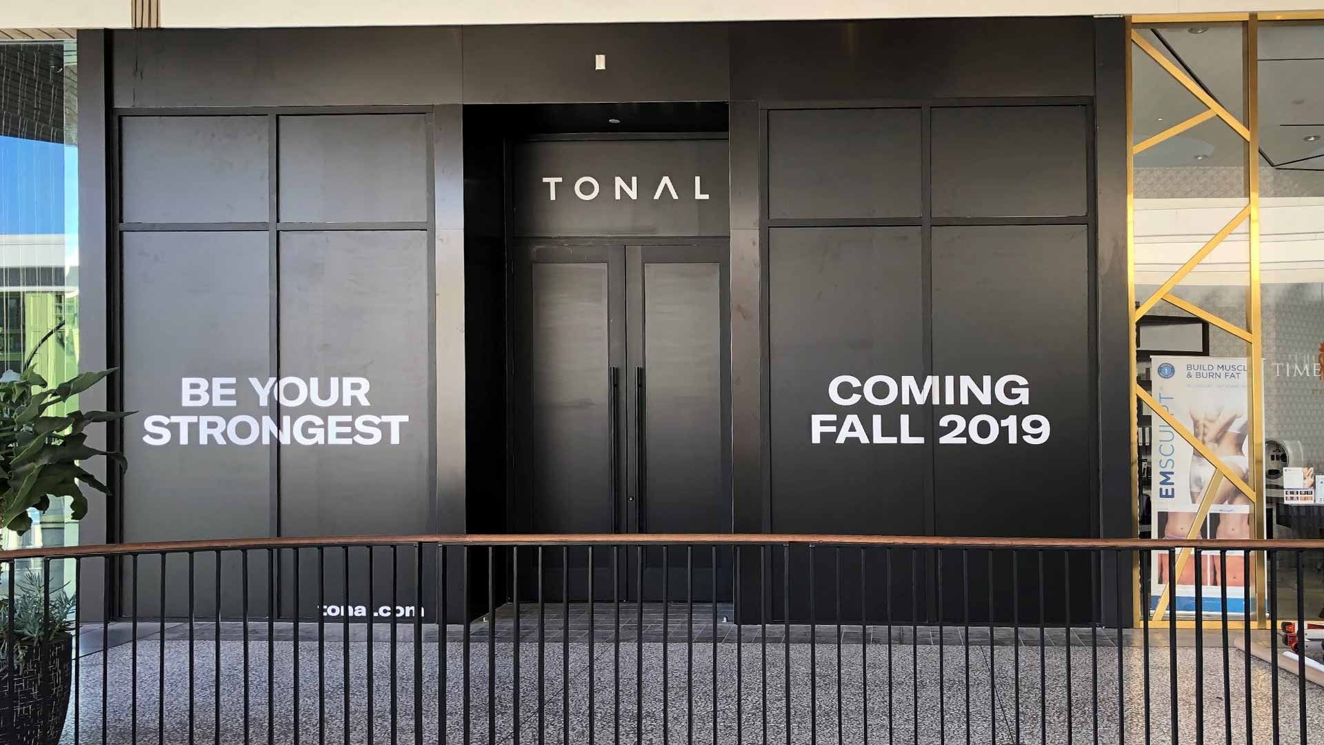 Black storefront for Tonal with text reading 