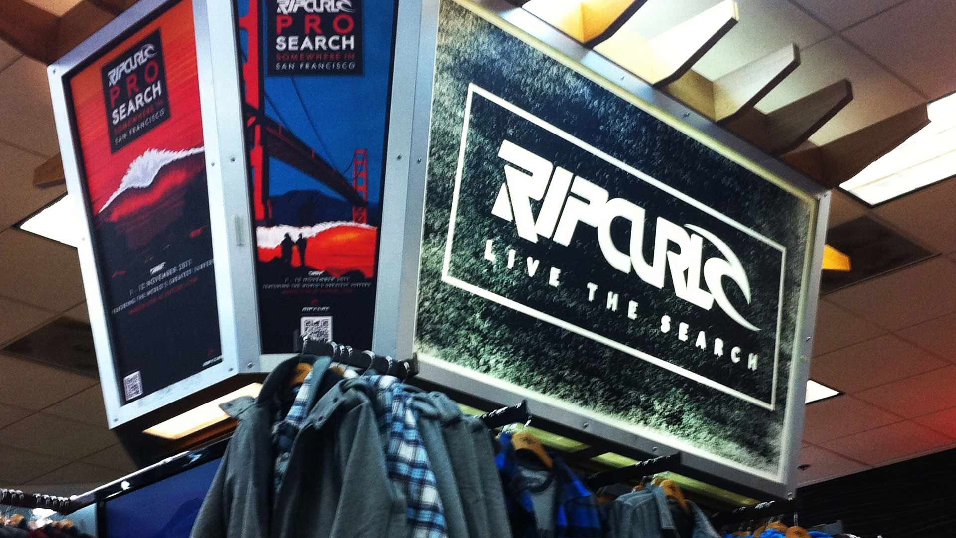 Rip Curl branding display in a store, featuring the 