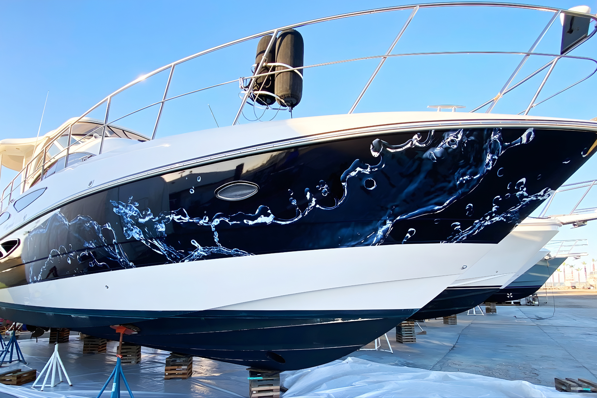 A green and white high-performance boat labeled 