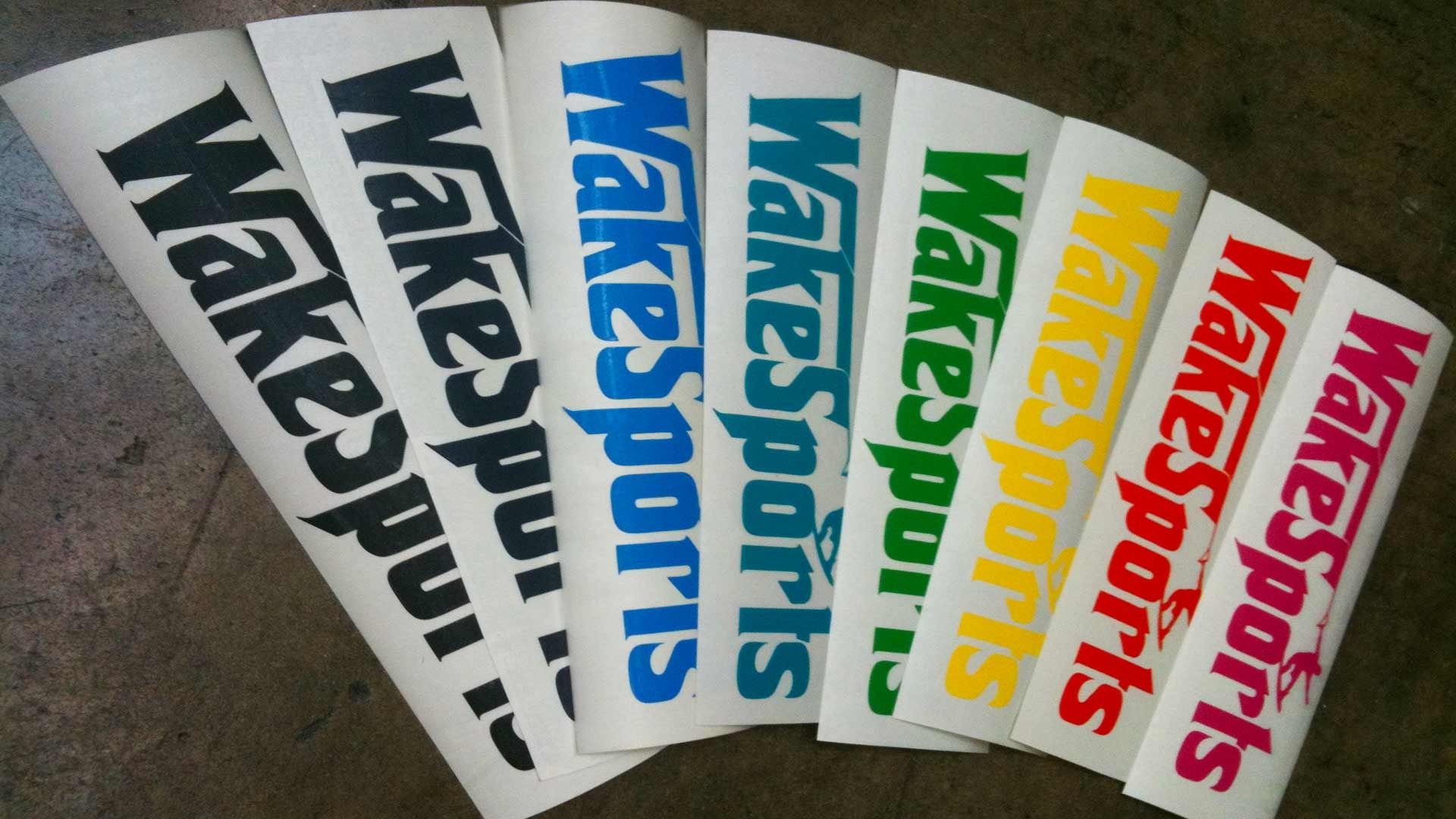 Eight vinyl decals reading 