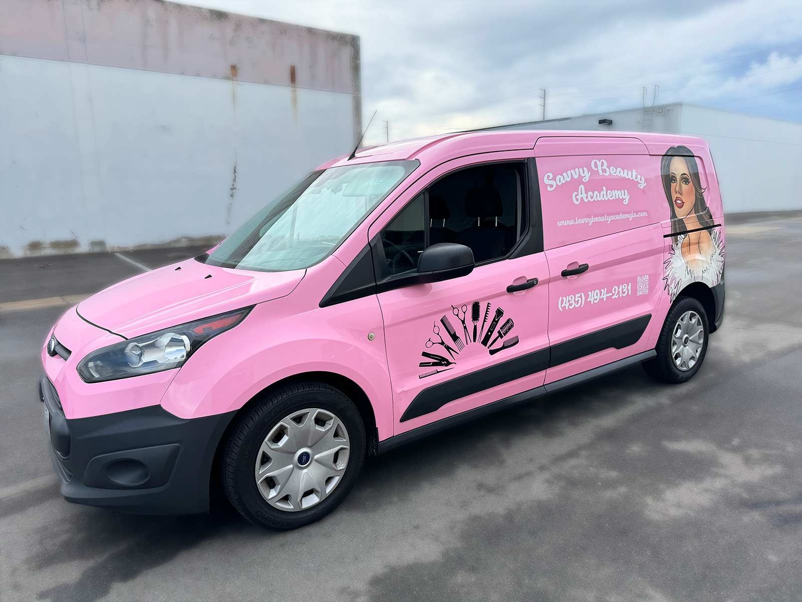 A bright pink commercial van featuring beauty branding, makeup brush graphics, and a phone number parked on asphalt.