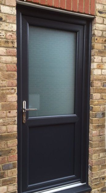 black door with misted glazing