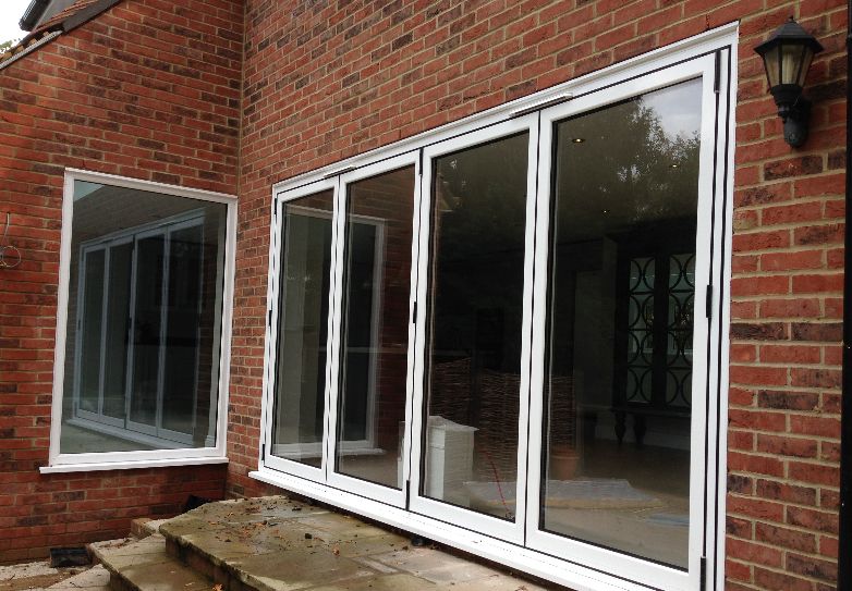 white exterior bifolding door sets