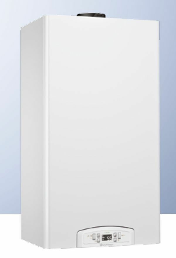 Una caldaia bianca è appoggiata su un tavolo bianco.