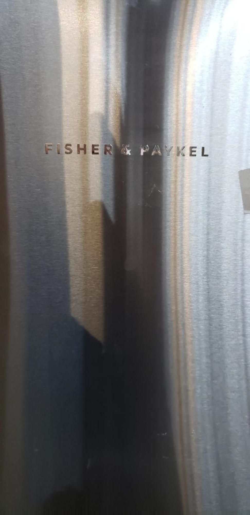 A close up of a fisher & paykel refrigerator door.
