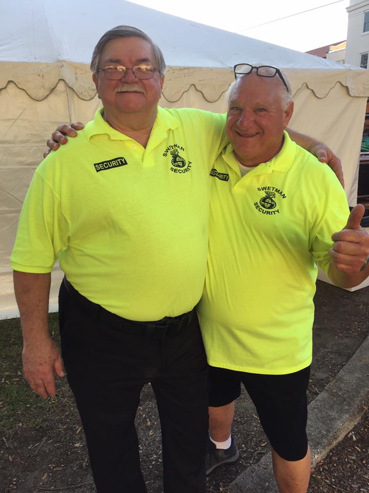 Two Swetman Security Service Banner Staff Wearing Uniform — Biloxi, MS — Swetman Security Service Incorporated — Biloxi, MS — Swetman Security Service Incorporated