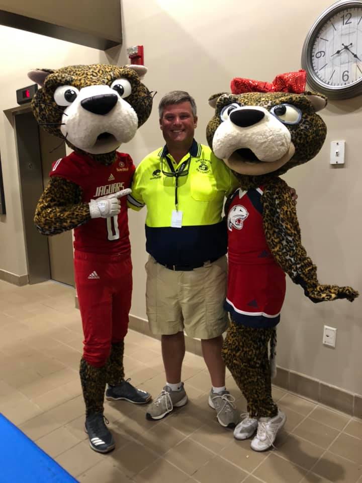 Staff with Two Mascots — Biloxi, MS — Swetman Security Service Incorporated — Biloxi, MS — Swetman Security Service Incorporated