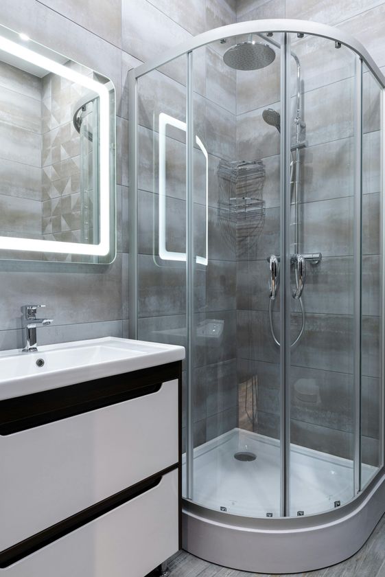 Grey tiled modern bathroom in Stoke-On-Trent by Rose tiling