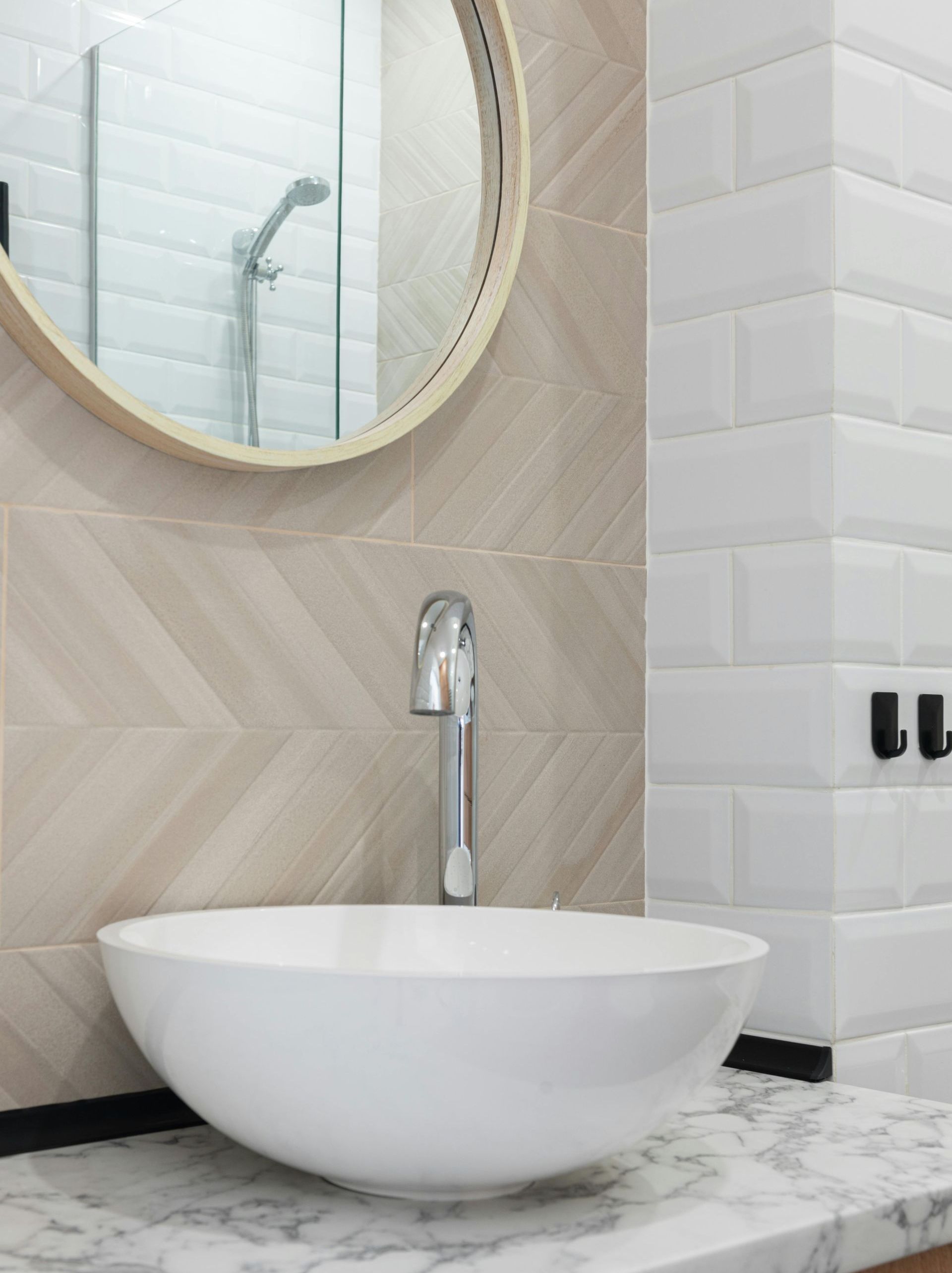 Creatively tiled bathroom with geometric tiles