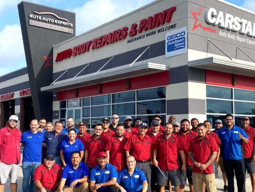 Team in front of the shop | Elite Auto Experts