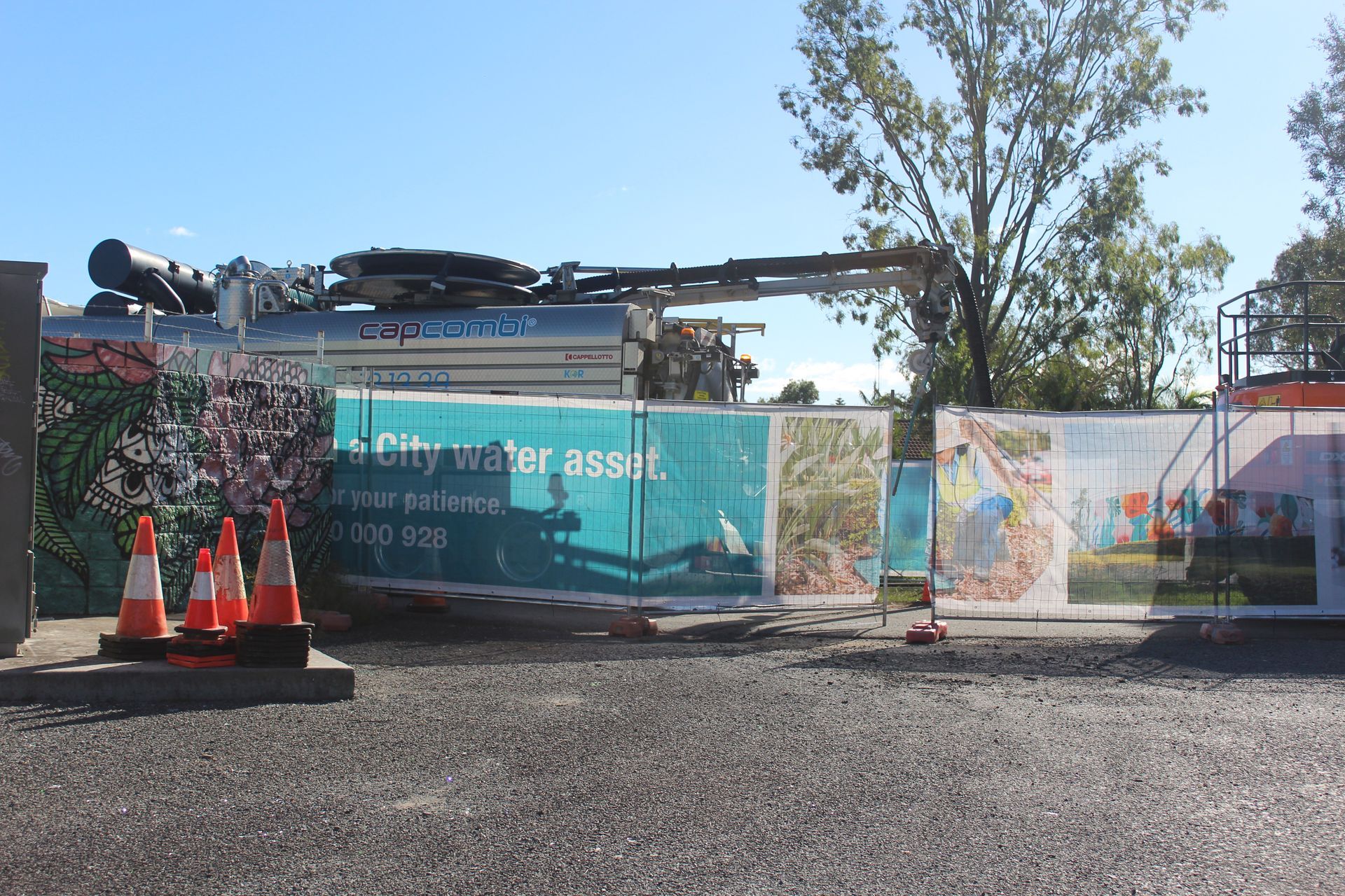 A construction site with a sign that says dirty water asset