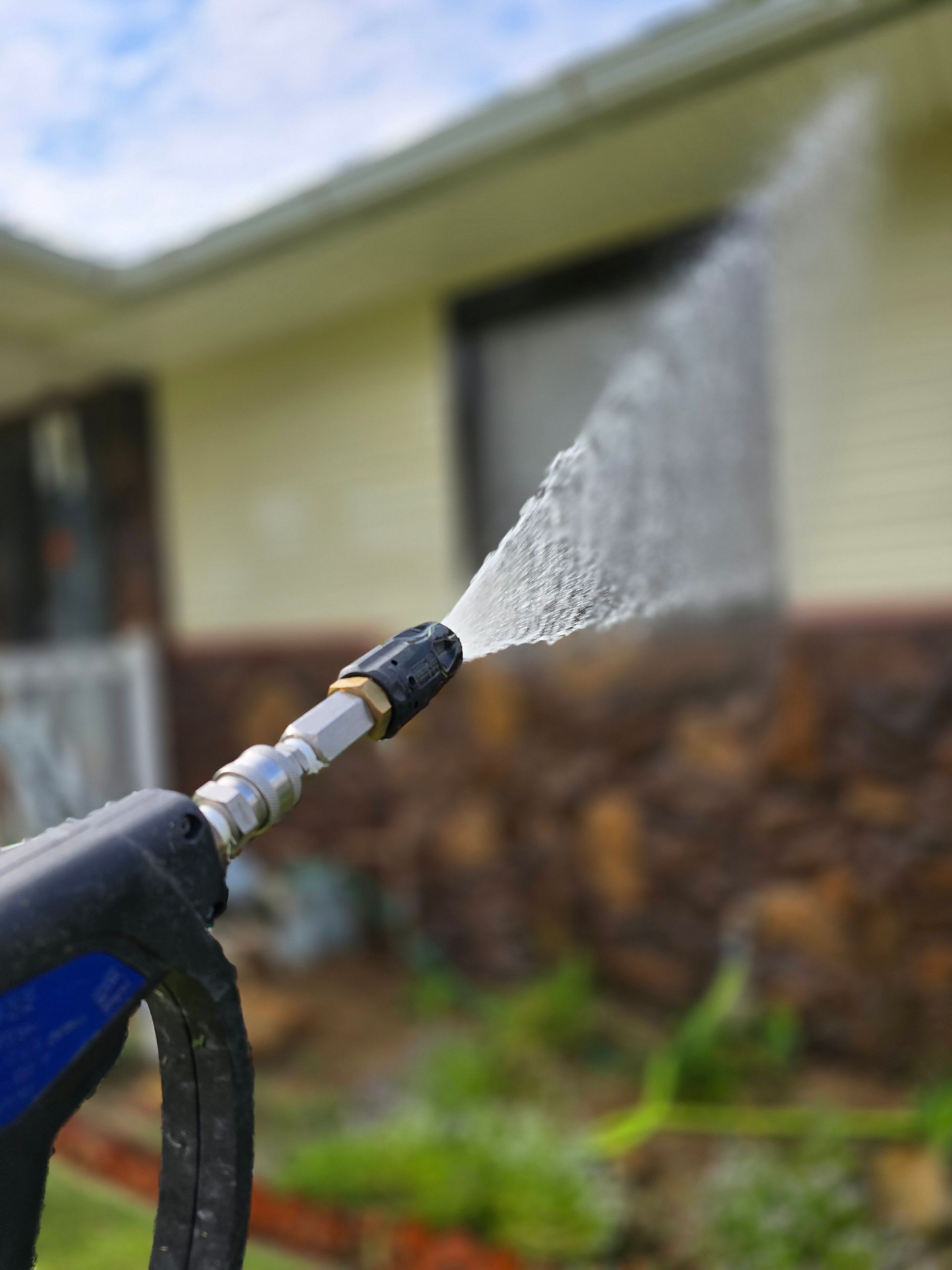 Person Is Using A High Pressure — Grayville, IL — Thompson’s Pressure Washing