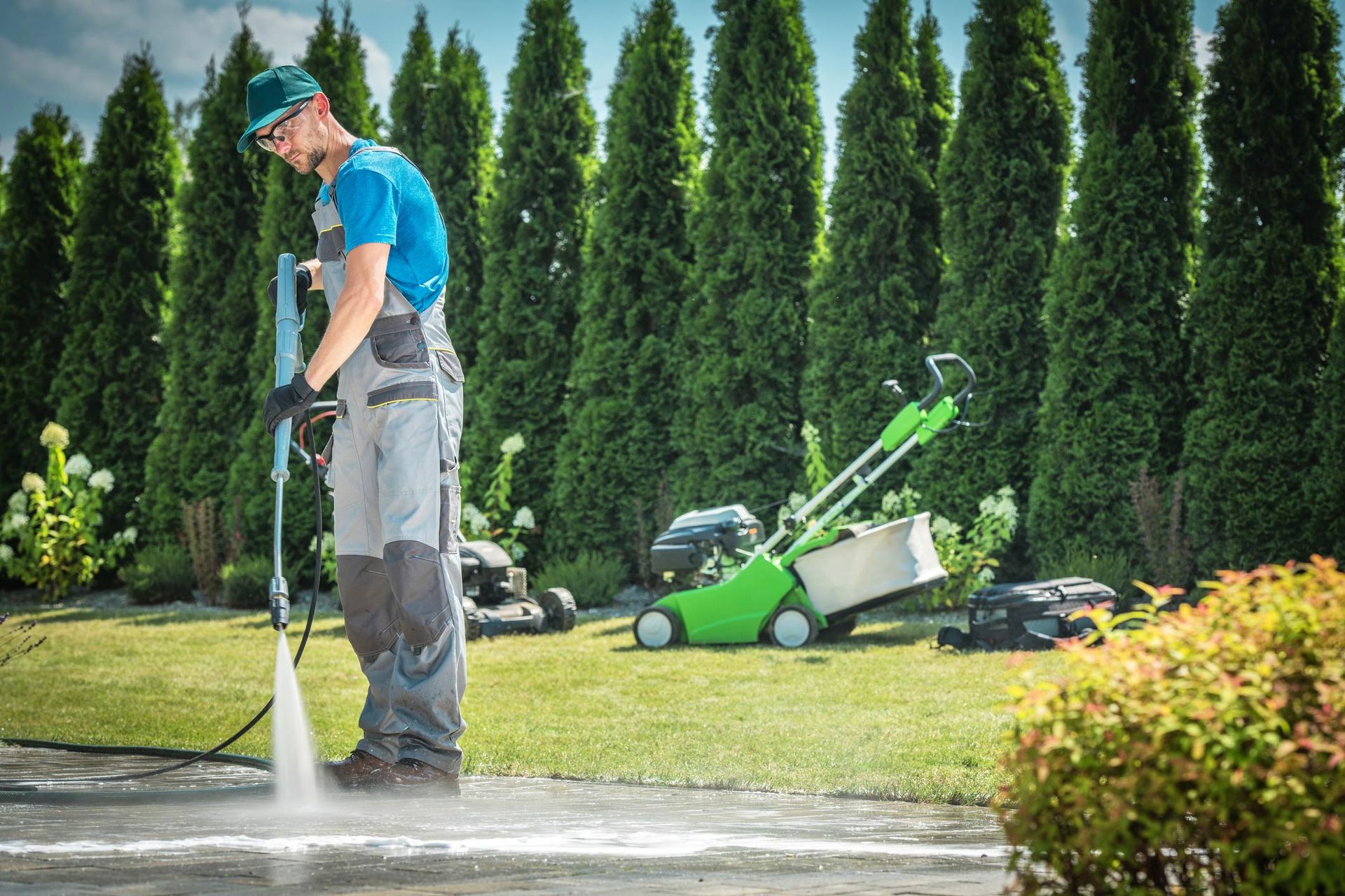 Man Is Cleaning The Sidewalk — Grayville, IL — Thompson’s Pressure Washing