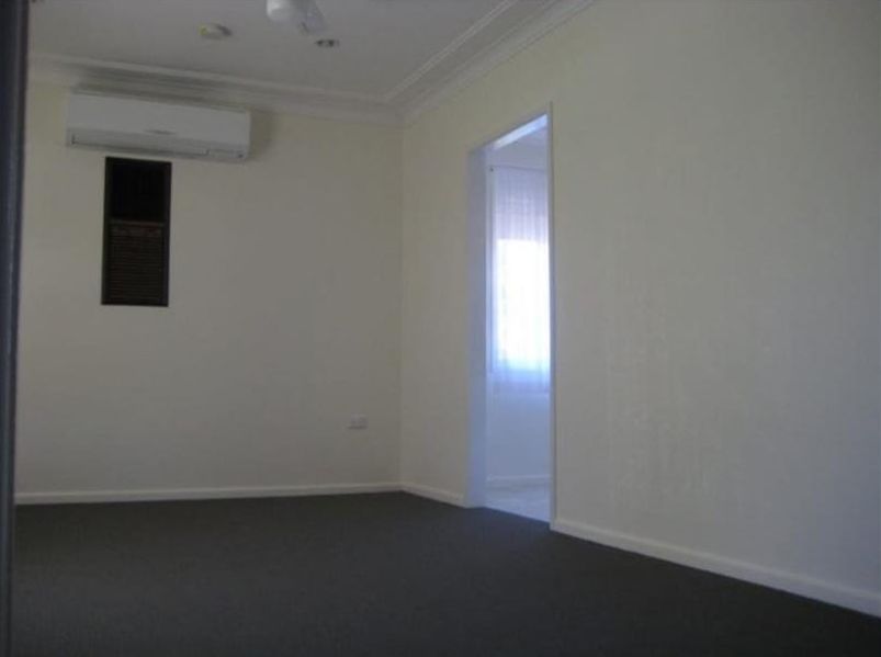 An Empty Room With a Door and a Window — Hancock Construction & Maintenance in Maitland, NSW