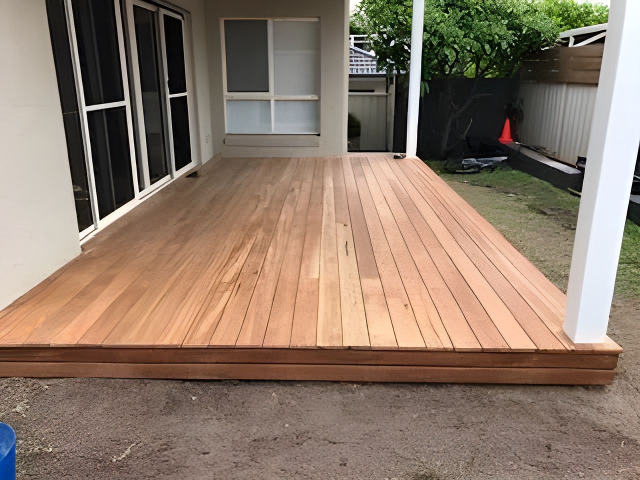Wooden Deck is Being Built in the Backyard of a House — Hancock Construction & Maintenance in Newcastle, NSW