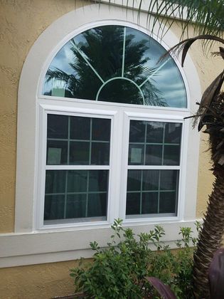 Roofing — Glass Window with White Frame in Orlando, FL