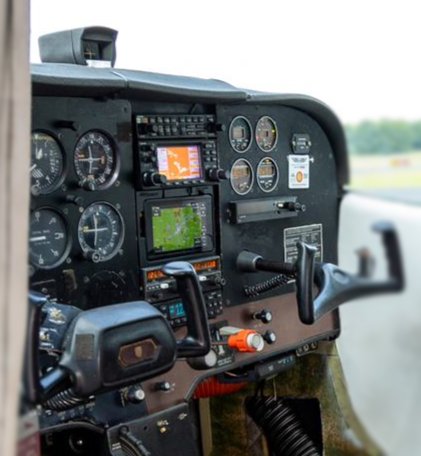 A cockpit of an airplane with a green screen that says ' gps ' on it