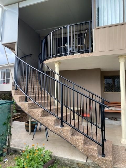 A House With Stairs Leading Up to the Second Floor — Lifestyle Aluminium Fabrication In Shellharbour, NSW