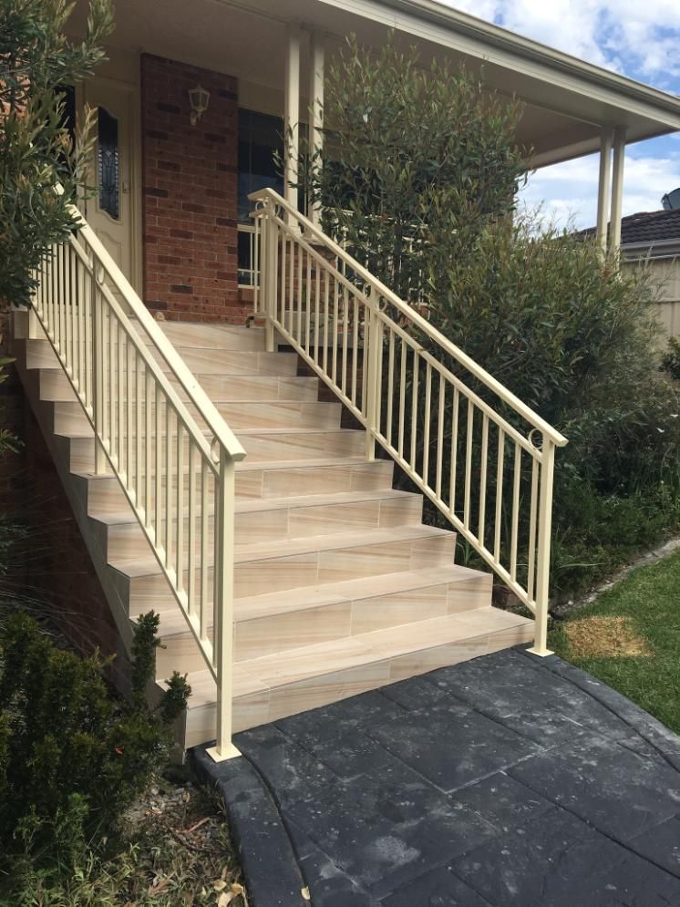 A Set of Stairs Leading Up to a House With a Railing — Lifestyle Aluminium Fabrication In Shellharbour, NSW