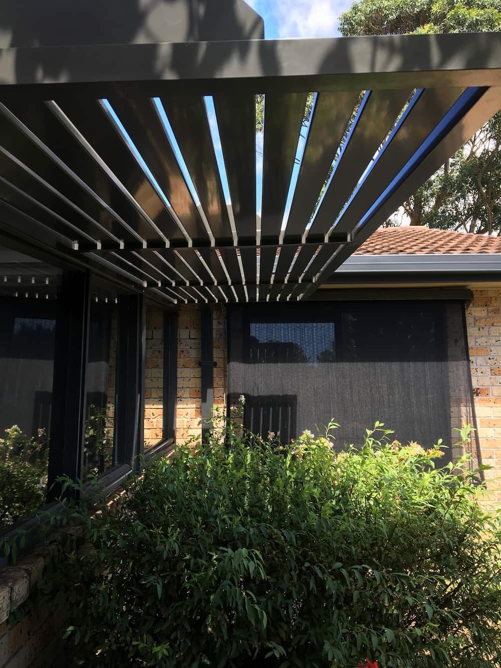 A House with A Pergola on Top of It — Lifestyle Aluminium Fabrication In Kiama, NSW