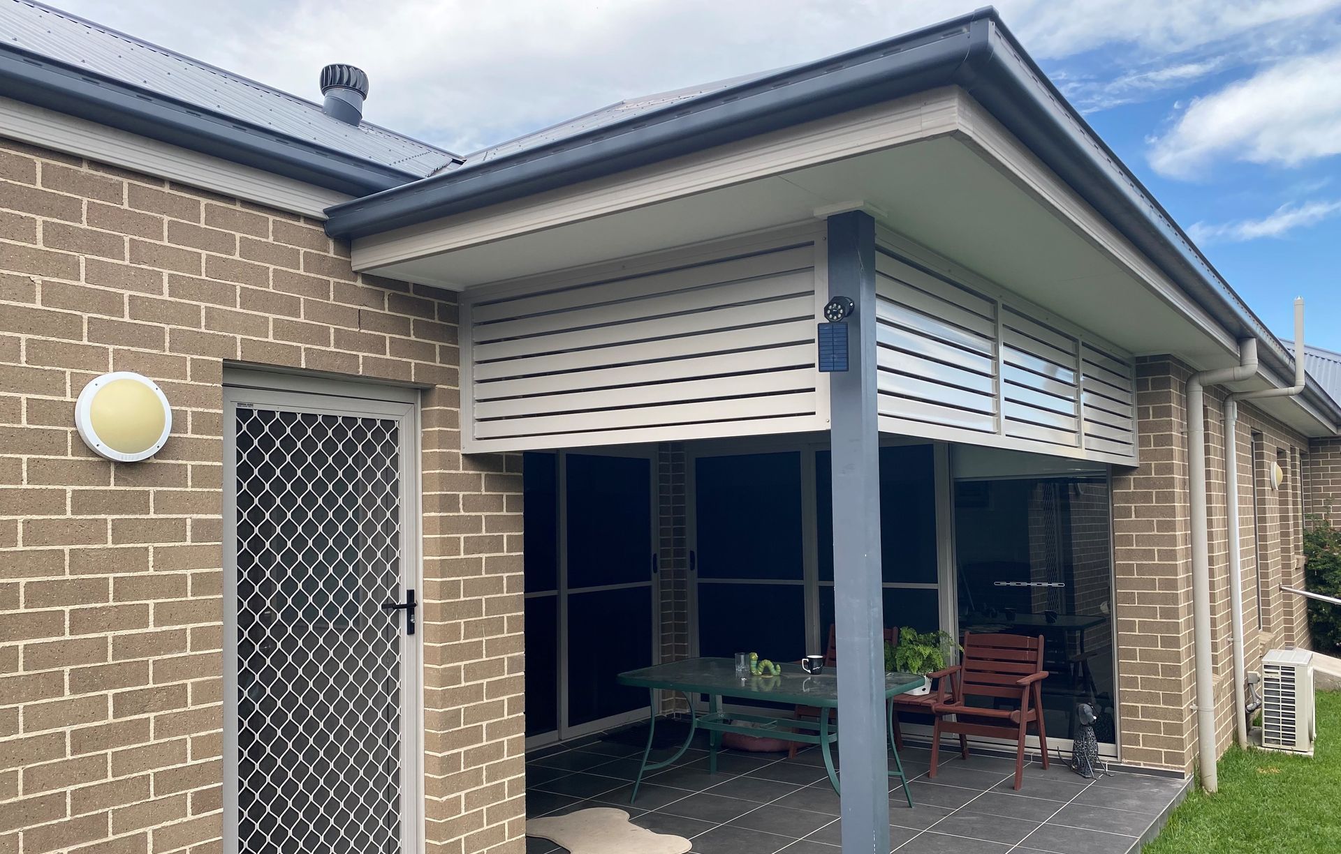 A House With A Outside Area Set Up — Lifestyle Aluminium Fabrication In Albion Park Rail, NSW