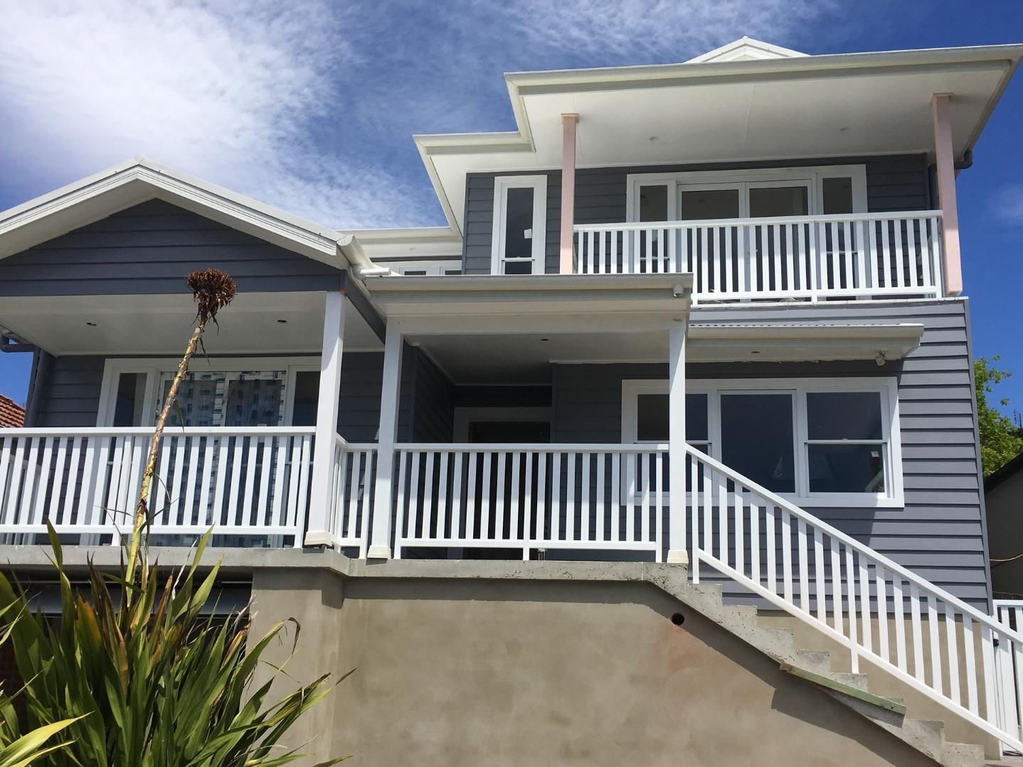 A Large House With Stairs Leading Up To The Second Floor — Lifestyle Aluminium Fabrication In Shellharbour, NSW