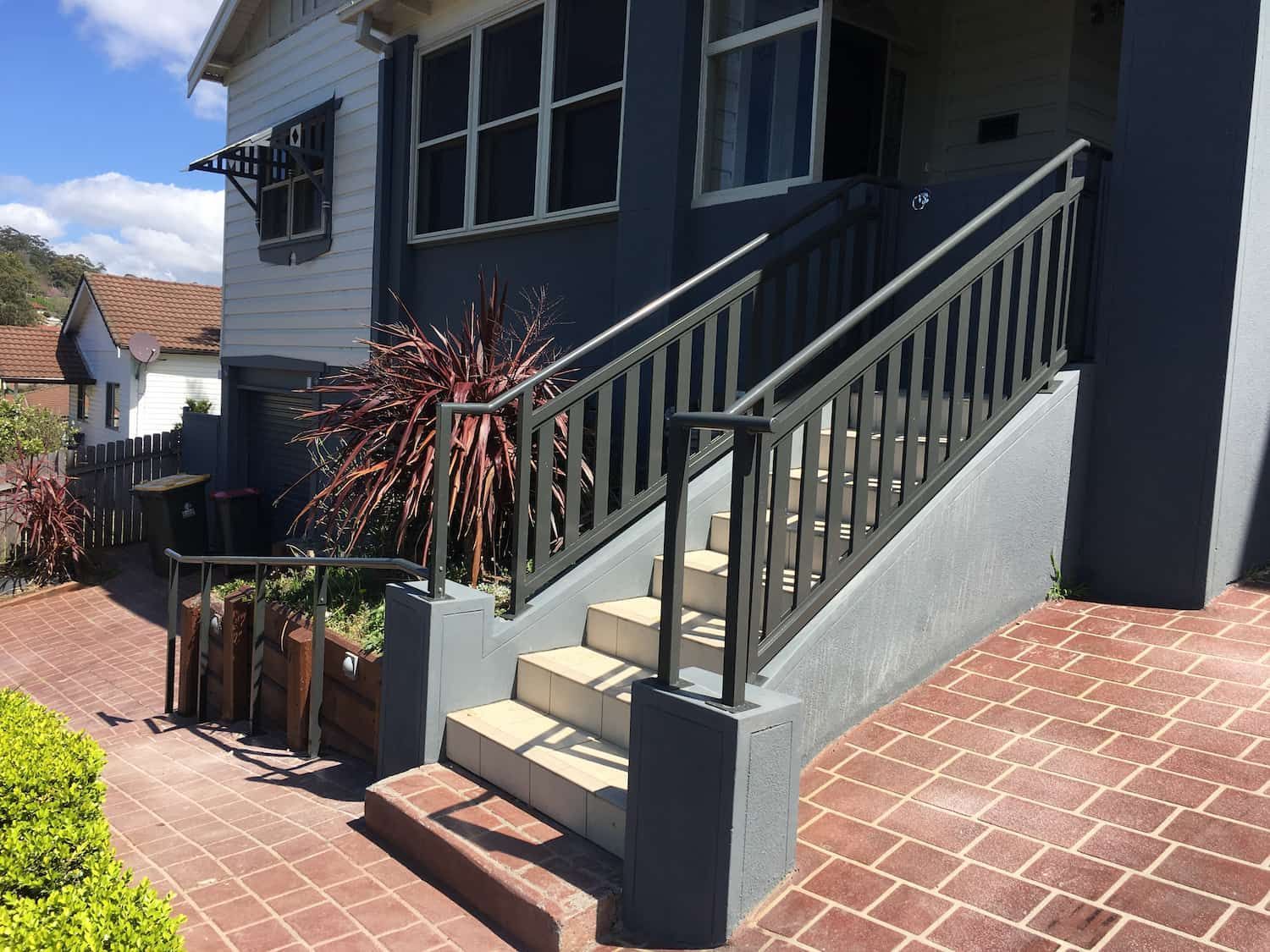 A House with Stairs Leading up To the Front Door — Lifestyle Aluminium Fabrication In Fairy Meadow, NSW