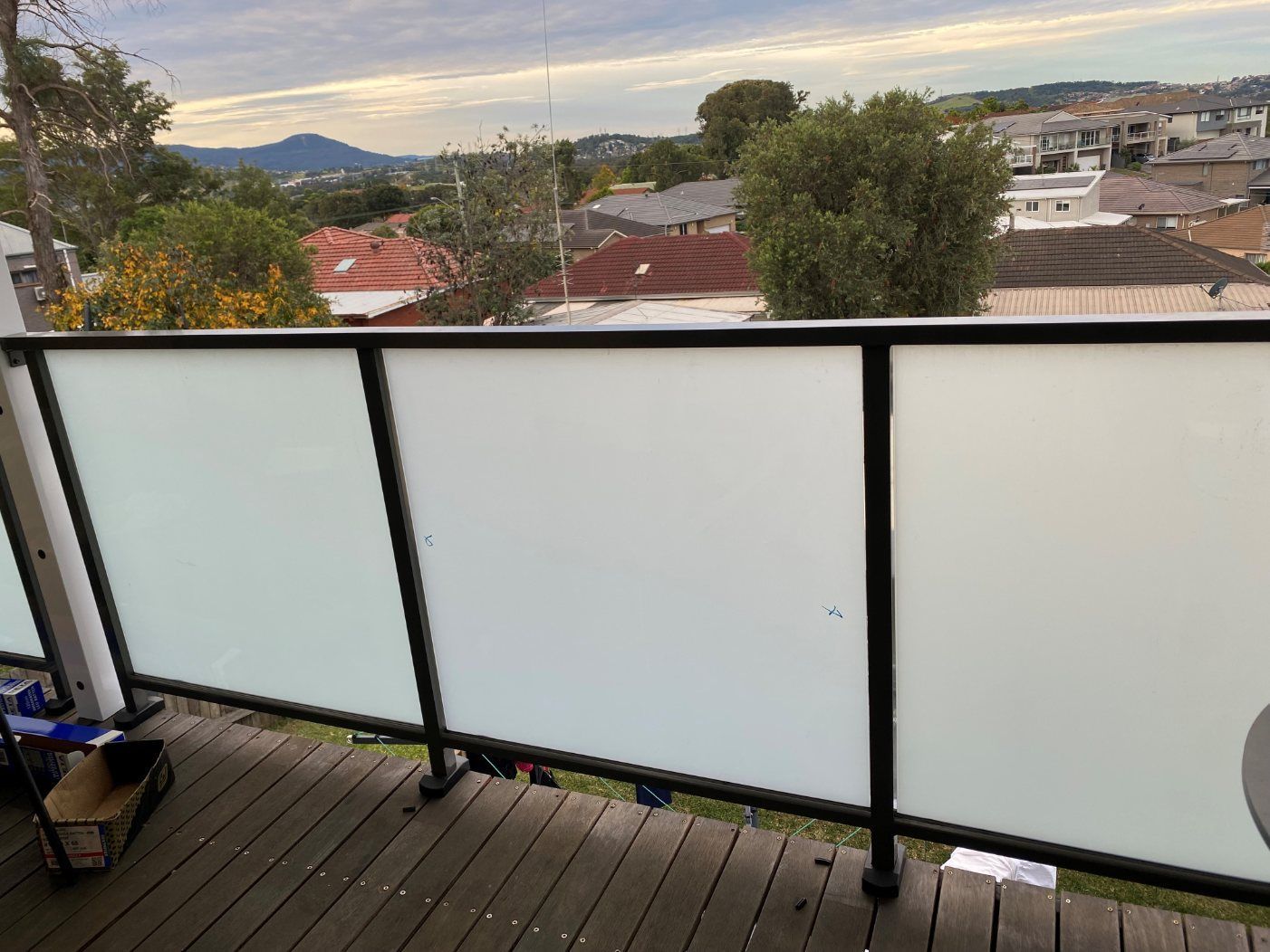 A Balcony with A View of A City and Mountains — Lifestyle Aluminium Fabrication In Albion Park Rail, NSW