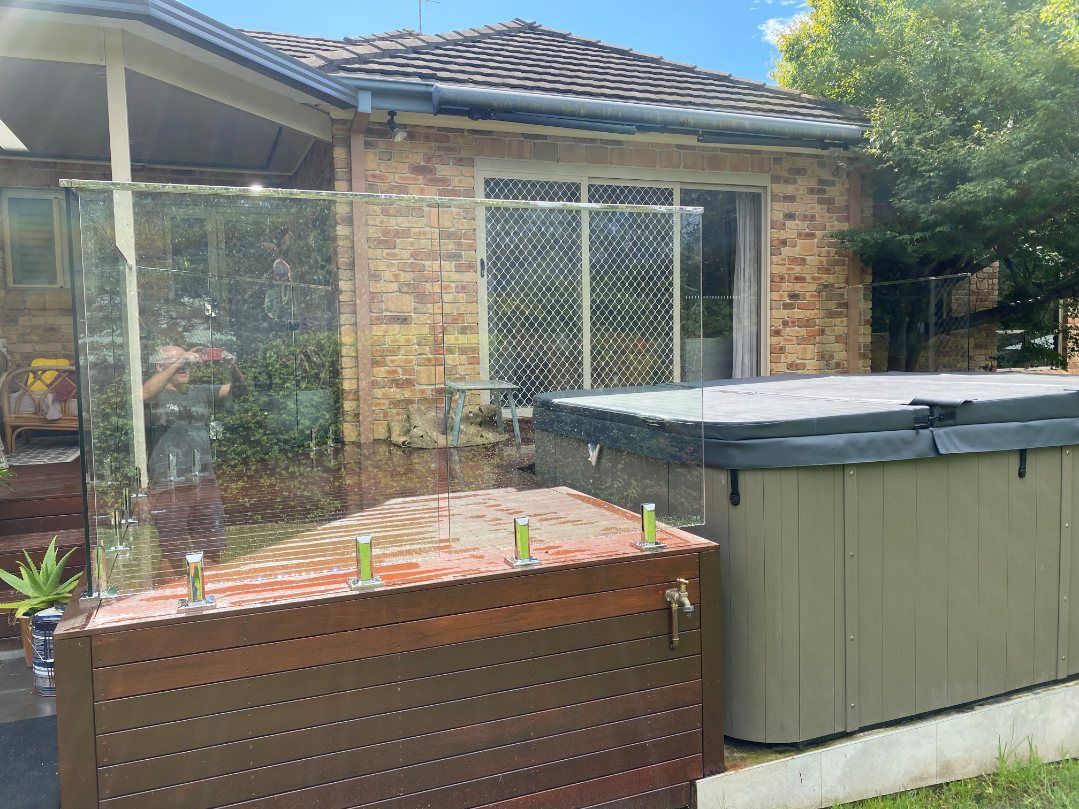 A Building with A Balcony and Clothes Hanging on It — Lifestyle Aluminium Fabrication In Albion Park Rail, NSW