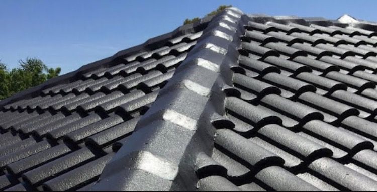 A Close Up Of A Roof With A Blue Sky In The Background — In-Time Roofing In Newcastle, NSW
